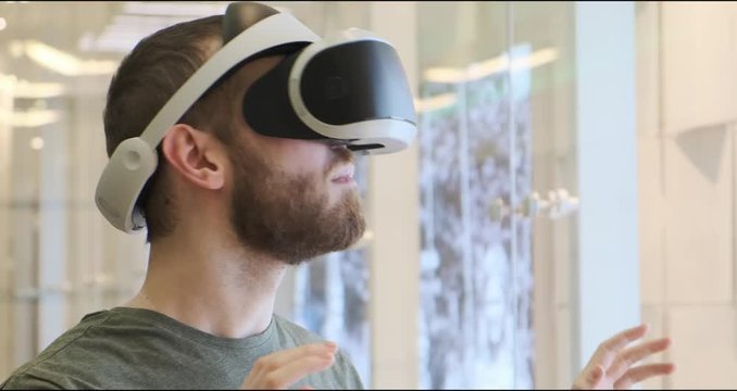 Man using virtual reality headset indoors 4k