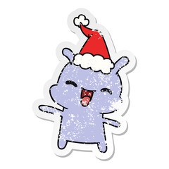christmas distressed sticker cartoon of kawaii alien