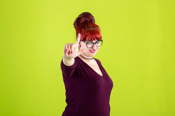 You are outsider. Studio shot of annoyed good-looking woman, feeling cool and confident while...