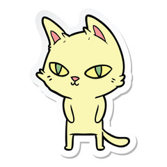 sticker of a cartoon cat with bright eyes