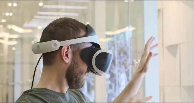 Man using virtual reality headset indoors 4k