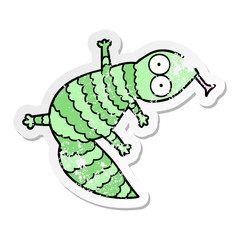 distressed sticker of a cartoon lizard