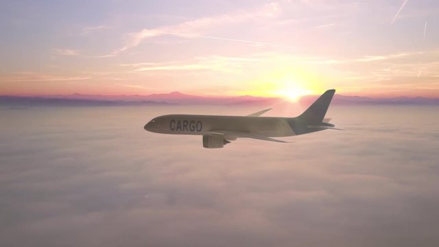 cargo plane in flight over clouds at sunset,flying with aircraft tracking