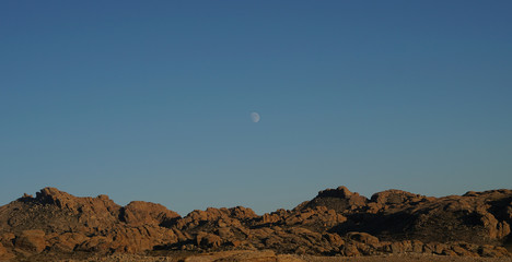 lonely moon on Gobi desert's sky