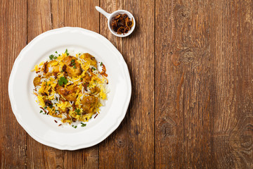 Biryani with chicken. Traditional Indian dish of rice and chicken marinated in spices and yoghurt.