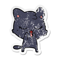 distressed sticker of a cartoon cat