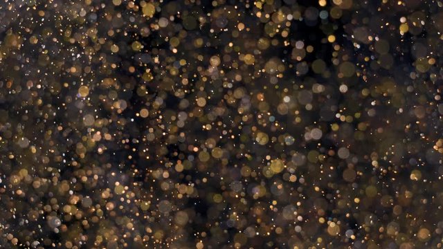 Elegant, detailed, and golden particles flow with shallow depth of field underwater