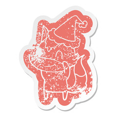 friendly cartoon distressed sticker of a wolf wearing santa hat