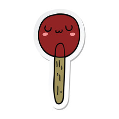 sticker of a cartoon lollipop