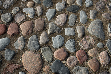 Round cubic stone road close up