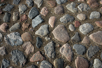 Round cubic stone road close up