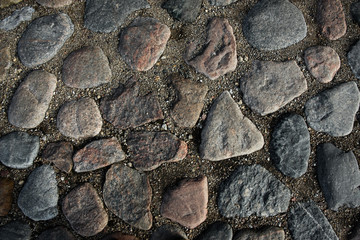 Round cubic stone road close up