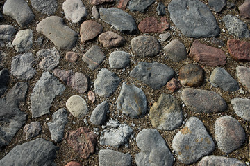 Round cubic stone road close up