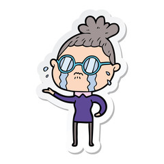 sticker of a cartoon crying woman wearing spectacles