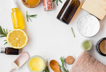 Natural skincare ingredients with manuka honey, lemon, essential oil, clay, balm, rosemary herbs...