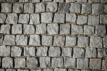 Round cubic stone road close up