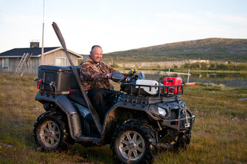 Fototapeta premium Fisherman in the car