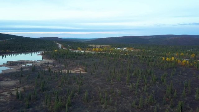 Spectacular aerial drone view of lush green landscape along the Richardson Highway in Meiers Lake, Alaska