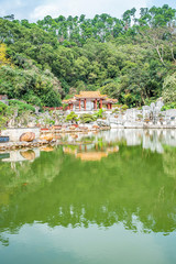 Fototapeta na wymiar The ancient architectural garden courtyard of the bonsai garden of Shenzhen Xianhu Botanical Garden