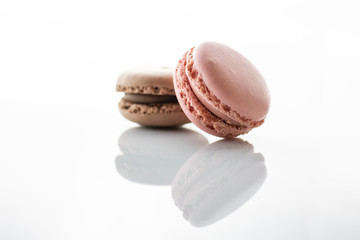 Brown and pink macaroons isolated