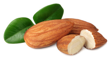 almond with green leaves isolated on white background