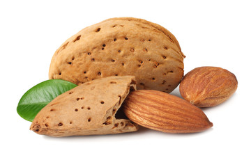 almond with green leaves isolated on white background