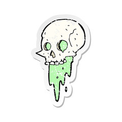 retro distressed sticker of a gross halloween skull cartoon