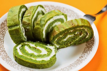 Spinach and curd wrap on plate.