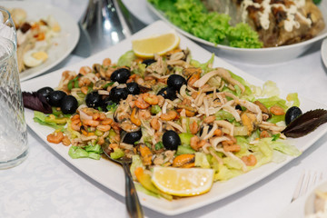 Fresh shrimp salad on the holiday table.