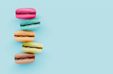 High detailed colourful macarons on blue background, vector illustration