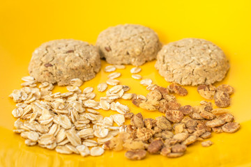 Healthy cereals and cookies on plate. Selective focus.