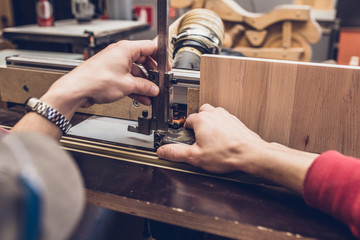 Carpentry workshop - preparation for the operation of the milling machine - setting the height of the cutter