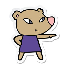 sticker of a cute cartoon bear in dress