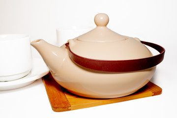 teapot and cups on white background isolated