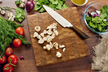 Close-up beautiful cutting board with a cutting knife
