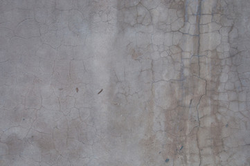 Cracked grey concrete stone wall background