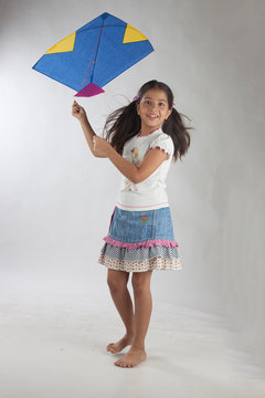 Indian Girl Child Flying Kite