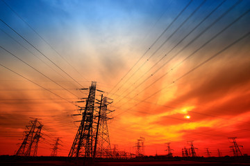 Electric tower, silhouette at sunset