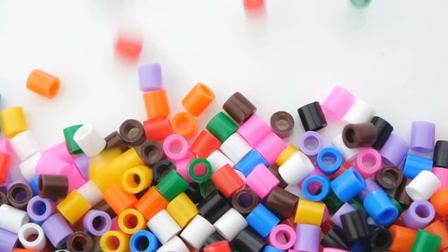 Colorful fusible plastic beads. Close up.