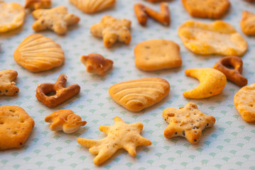 Different shapes of crackers. Healthy cookie salty and crispy. Food background.