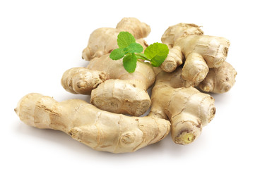 Ginger roots with lemon and mint leaves