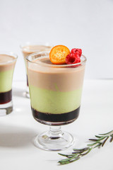 Delicious Triple chocolate mousse desserts with glasses