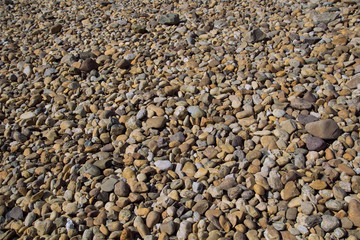 Pebble stone background outside.