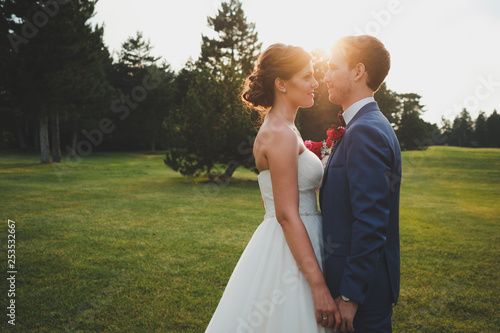 bride and groom at sunset