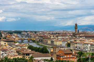 Fototapeta na wymiar Panaromic view of Florence townscape cityscape viewed from Piazzale Michelangelo (Michelangelo Square) with ponte Vecchio and Palazzo Vecchio