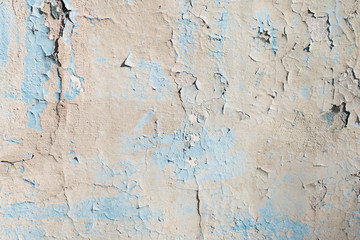 blue and grey texture with scratches and cracks. blue background. blue and grey pattern.light wall
