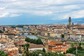 Fototapeta na wymiar Panaromic view of Florence townscape cityscape viewed from Piazzale Michelangelo (Michelangelo Square) with ponte Vecchio and Palazzo Vecchio