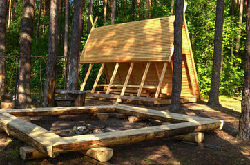 Wooden house, hut in the forest for tourists, fishermen and hunters for rest and cooking. Republic...