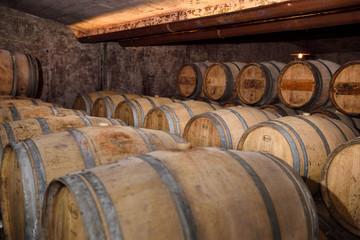 Constant temperature arched cellar with French barrique oak barrels to age wine at Kabaj Morel...