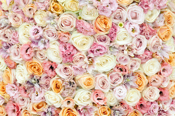Pink and orange roses and poppies flowers background